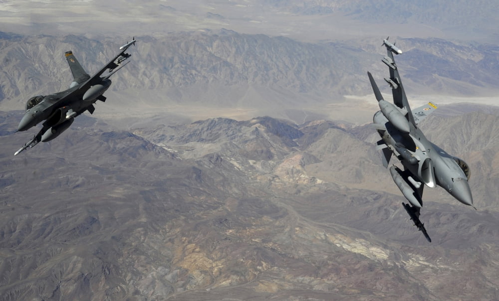 Two F-16 Fighting Falcons break out of formation Canvas Art - Stocktrek Images (36 x 22)