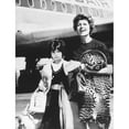 thumbnail image 2 of Rita Hayworth And Her Daughter Princess Yasmin Arrive At New York City From Spain. June 3 History, 2 of 2