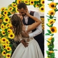 thumbnail image 1 of Guirnalda decorativa de girasoles | Paquete de 3 enredaderas artificiales de girasol de 2,3 m con hojas | Decoración floral primaveral de plástico amarillo para interiores, exteriores, puertas,, 1 of 9