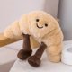 thumbnail image 4 of Muñeco de peluche de 23 cm con forma de croissant sonriente y simulación creativa, para decoración de fiestas, regalo de San Valentín, regalo del día del niño (1 pieza), 4 of 4
