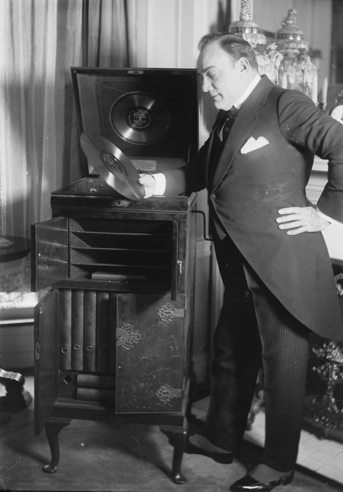 Enrico Caruso Peruses a Disk if his Singing by a Palestine Ubuy