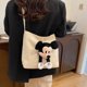 thumbnail image 2 of Bolso de lona de rayas de gran capacidad para mujeres de 2025, nuevo estilo de moda y lindo de Mickey Mouse, bolso tote para libros., 2 of 10