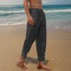 thumbnail image 1 of Pantalones largos para hombre, color liso, holgados, informales, con bolsillos, de lino, cintura elástica, con cordón ajustable, pierna dividida, de poliéster., 1 of 7