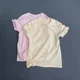 thumbnail image 4 of Camiseta de manga corta de algodón puro suave en color albaricoque leche, corte holgado para hombres y mujeres, estilo de viaje al trabajo de verano, cuello redondo, 4 of 4