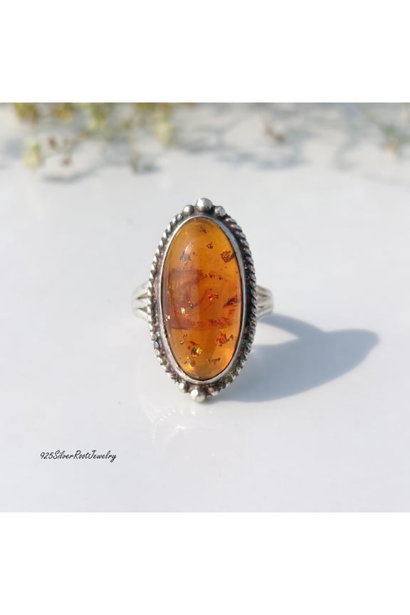 - Vintage Amber Ring Featuring Natural Baltic Amber Oval Statement Gemstone Set in 925 Sterling Silver With Oxidized Finish and Twisted Rope Band
