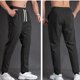 thumbnail image 4 of Mens Casual Pantalones Sueltos de Color Sólido Bolsillo Elástico Cómodo Pantalones Deportivos Hombres para Escalada Al Aire Libre Y Uso Diario, 4 of 4