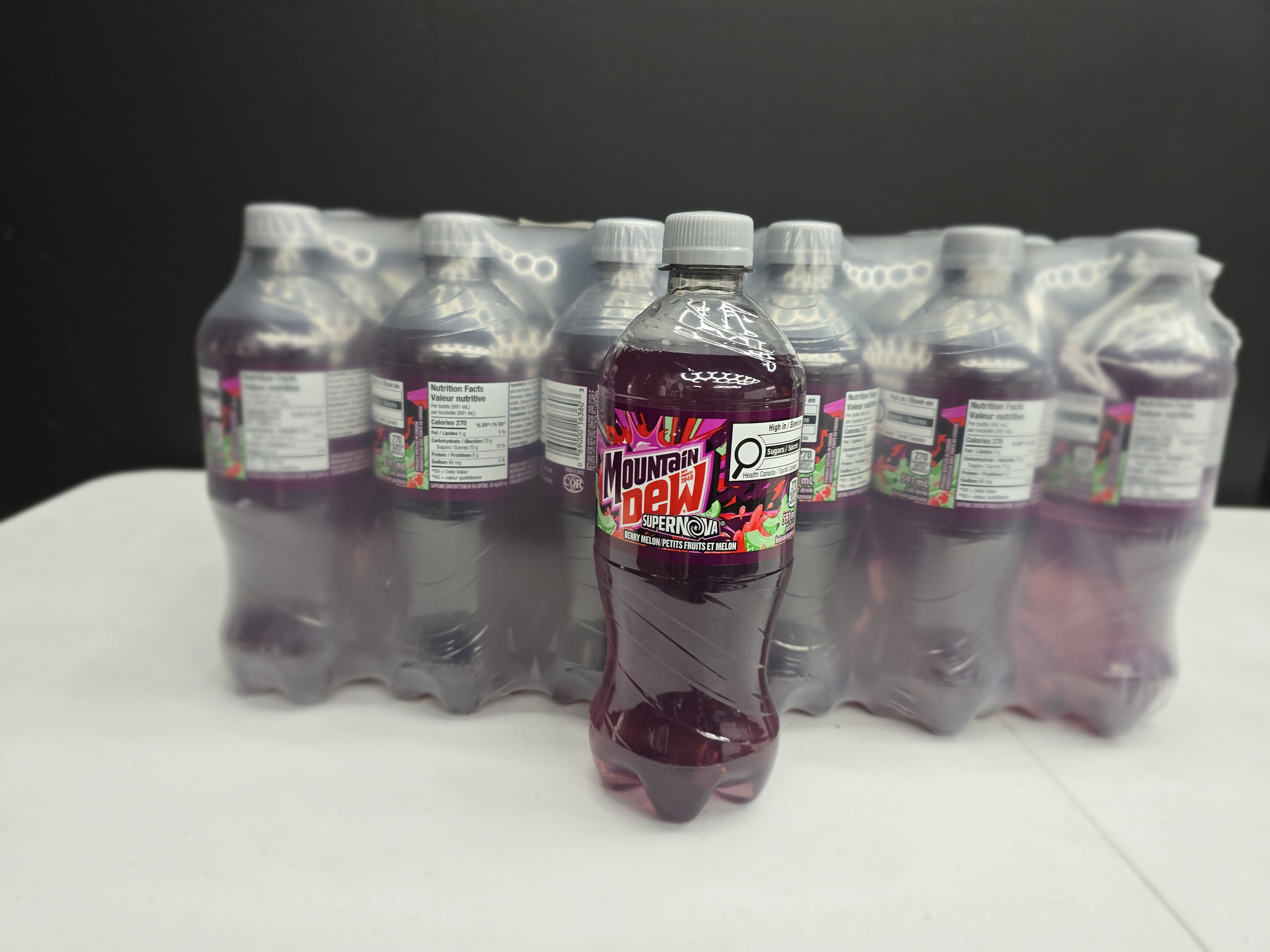 Mountain Dew Supernova Berry Melon Soda, 20 fl oz (591ml) Bottles, 24-Pack Case (Canadian Import)