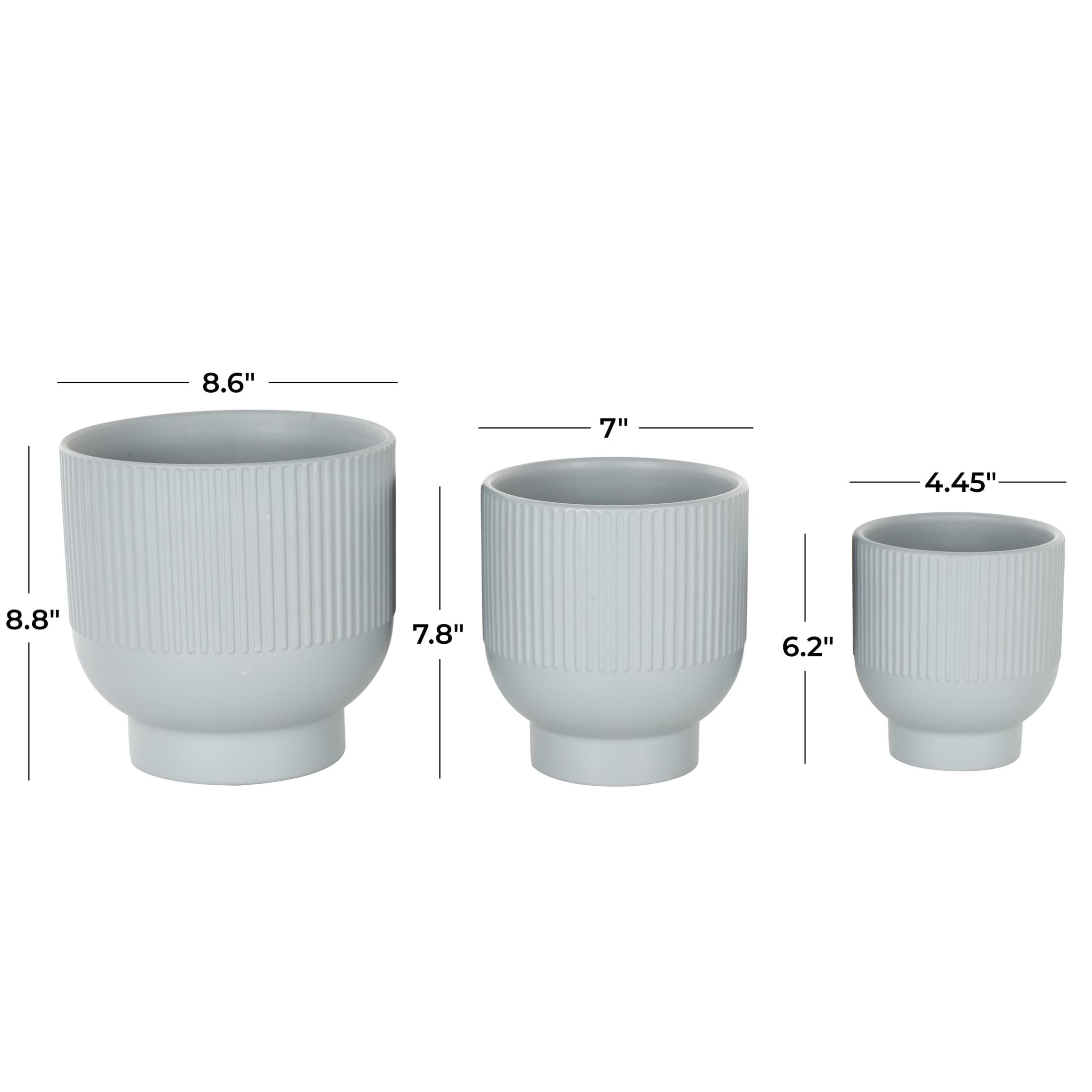 DecMode 9", 7", 5"W Light Blue Ceramic Planter with Linear Grooves and Tapered Bases (3 Count)