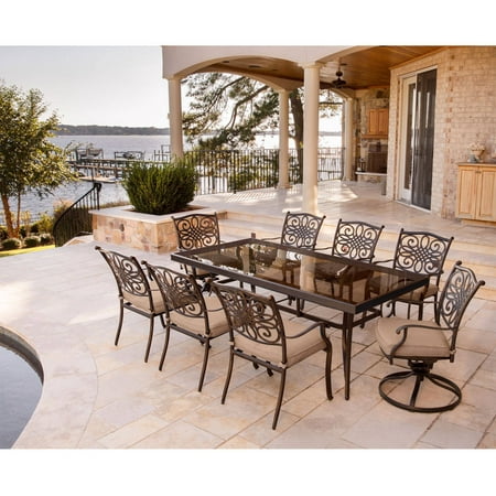 Hanover Outdoor Traditions 9-Piece Dining Set with 42 x 84 Glass-Top Table 6 Stationary Chairs and 2 Swivel Rockers