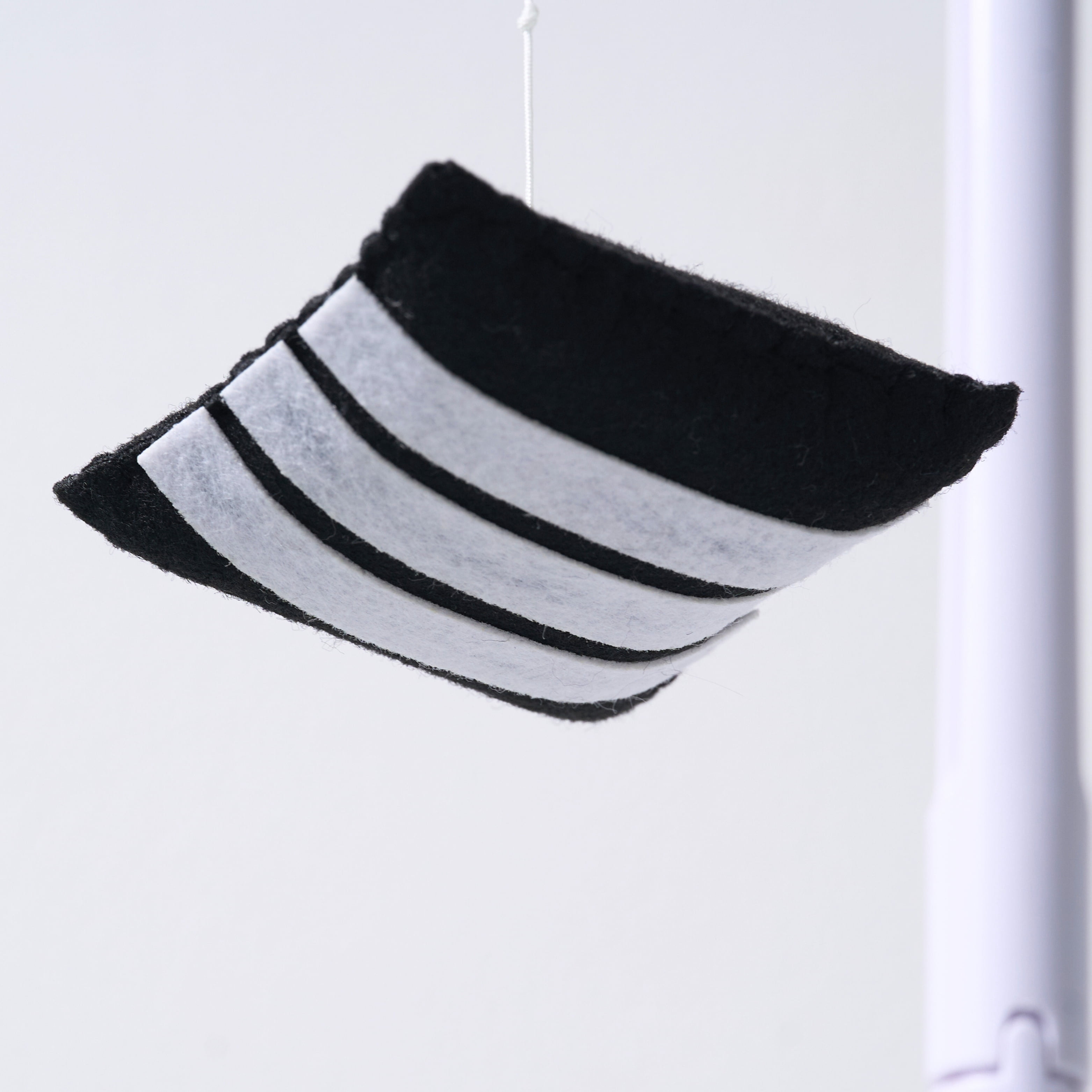 TINITIGIES Montessori Baby Mobile for Crib – High Contrast Black & White Newborn Mobile with Digital Music Box, Visual Stimulation for 0–5 Months, Fits Standard Cribs