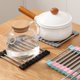 thumbnail image 5 of Roll Up Trivets Rack 304 de acero inoxidable multiuso resistente al calor compatible con platos calientes, almohadillas de cacerolas en encimeras, soportes para macetas Afortunado Sencillez, 5 of 5