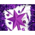 thumbnail image 2 of Decoración con forma de estrella en la copa de un árbol con, 2 of 7