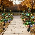 thumbnail image 6 of Solar Powered Mini Outdoor Christmas Trees, Waterproof LED Xmas Lights with Bells & Balls, 8 Modes Solar Stake Lights for Yard, Pathway, Garden, and Cemetery Holiday Decorations, 6 of 8