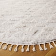 thumbnail image 3 of SAFAVIEH Moroccan Tassel Larry Geometric Shag Area Rug, Ivory, 3' x 3' Round, 3 of 7