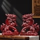thumbnail image 3 of Large red Qilin figurine, made of wood, featuring male and female fire Qilin, carved from rosewood, a solid wood home feng shui decoration., 3 of 4