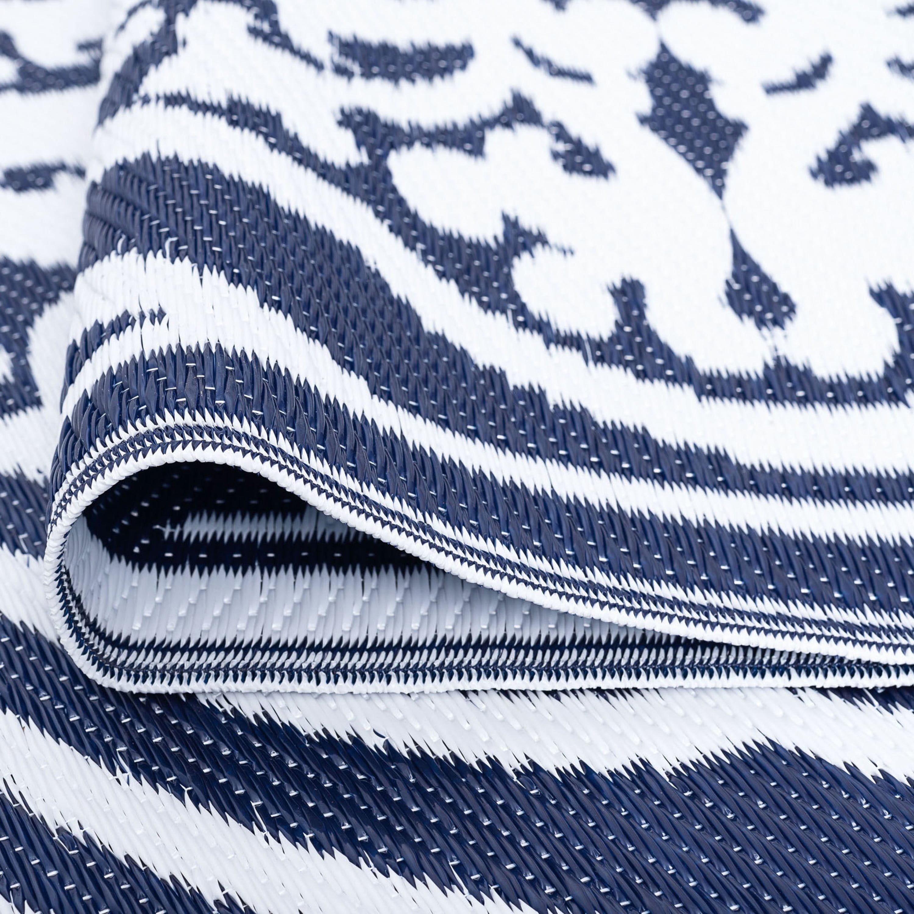 8x10 Reversible Navy and White Polypropylene Outdoor Damask Area Rug