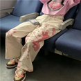thumbnail image 1 of Pantalones holgados hasta el tobillo estilo Y2k, pantalones de pierna ancha con estampado de grafiti rosa, pantalones Harajuku de Anime para mujer, pantalones vaqueros de Hip Hop de cintura alta, 1 of 5