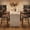Brown leather, variant on Bar Stools, Counter Height Stools Set of 4 26" Wide Seat with Arms & Back - Upholstered, Metal Footrest, Easy Assembly for Kitchen Island, Rustic Black Faux Leather