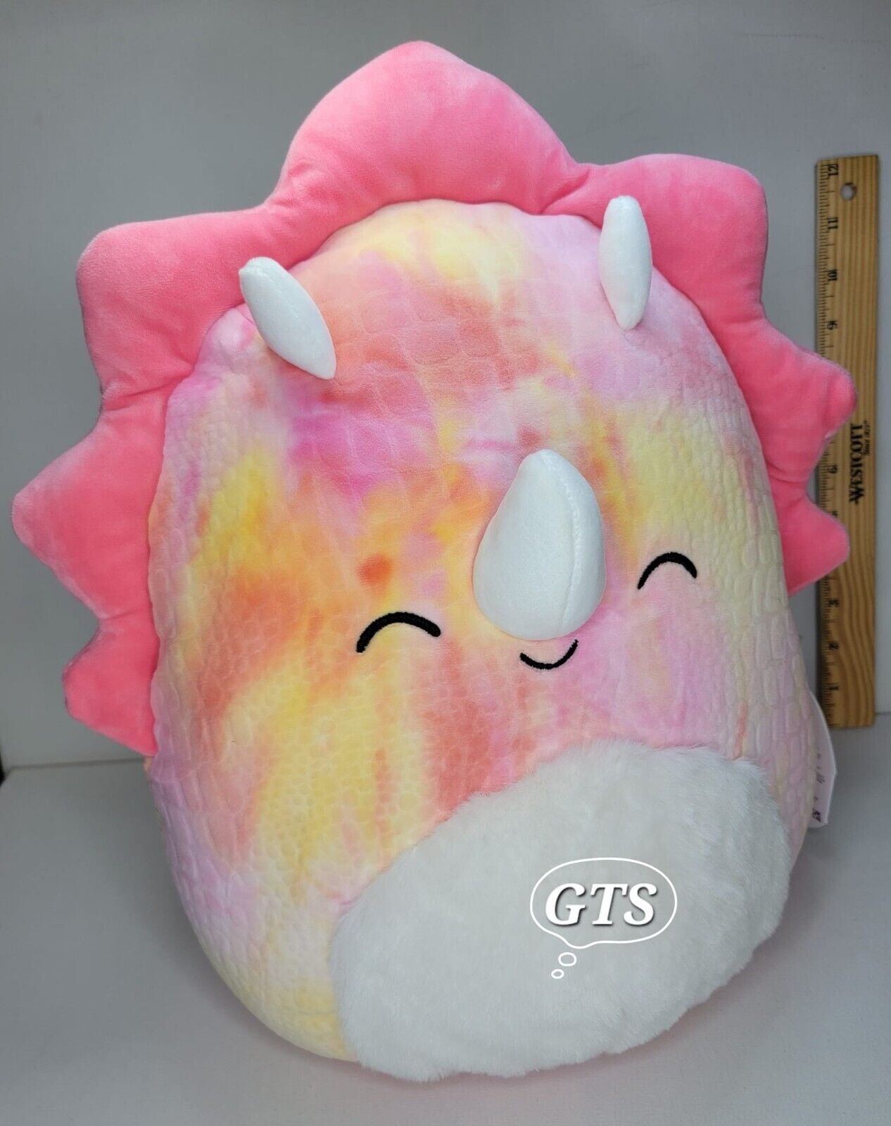 Pink dinosaur squishmallow hotsell