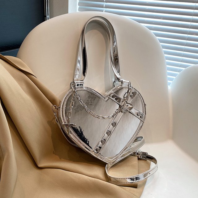 Bolso bandolera elegante para mujer Bolso de hip hop en forma de corazón Bolso al aire libre para niñas de especias de cuero PU