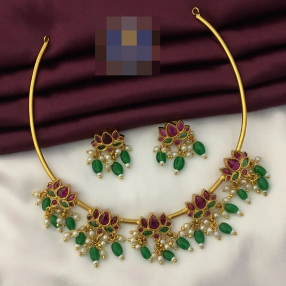 South Indian Bollywood Lotus Design Gold-Plated Pearl Beaded Hasli Choker Necklace Set – Matte Finish Brass with Ruby, Green & White Kemp Stones, AD CZ Accents, Matching Drop Earrings.
