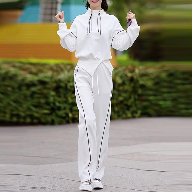 Figura otoño e invierno nuevo suéter holgado y ceñido a la cintura de alta calidad de moda traje deportivo informal de dos piezas para mujer