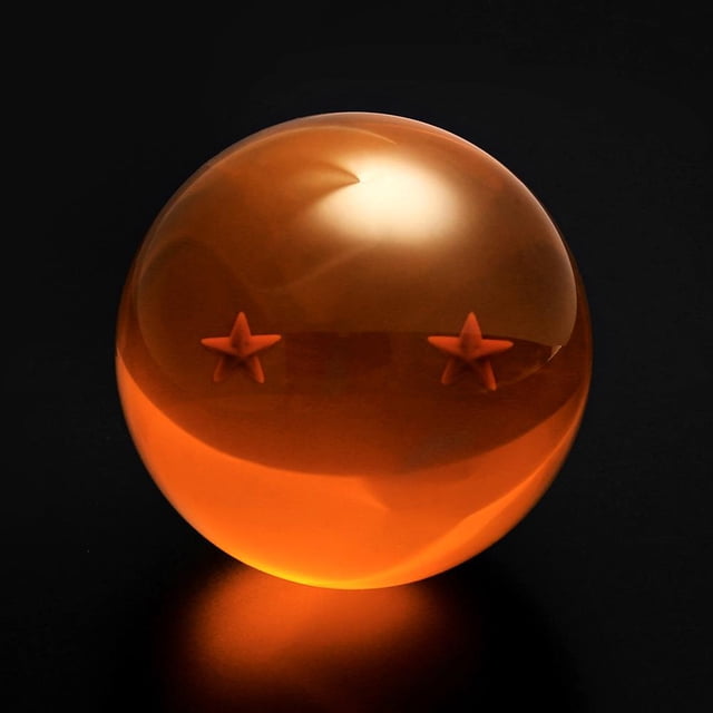 anime dragon ball adornos bola de cristal figuras coleccionables juguetes (2 estrellas) Bola de cristal acrílica naranja translúcida de 3.5 cm con dos estrellas internas, vista frontal centrada sobre fondo negro, acabado brillante y reflejos; decoración coleccionable estilo japonés, a menudo usada como adorno de estante o vitrina para colecciones.