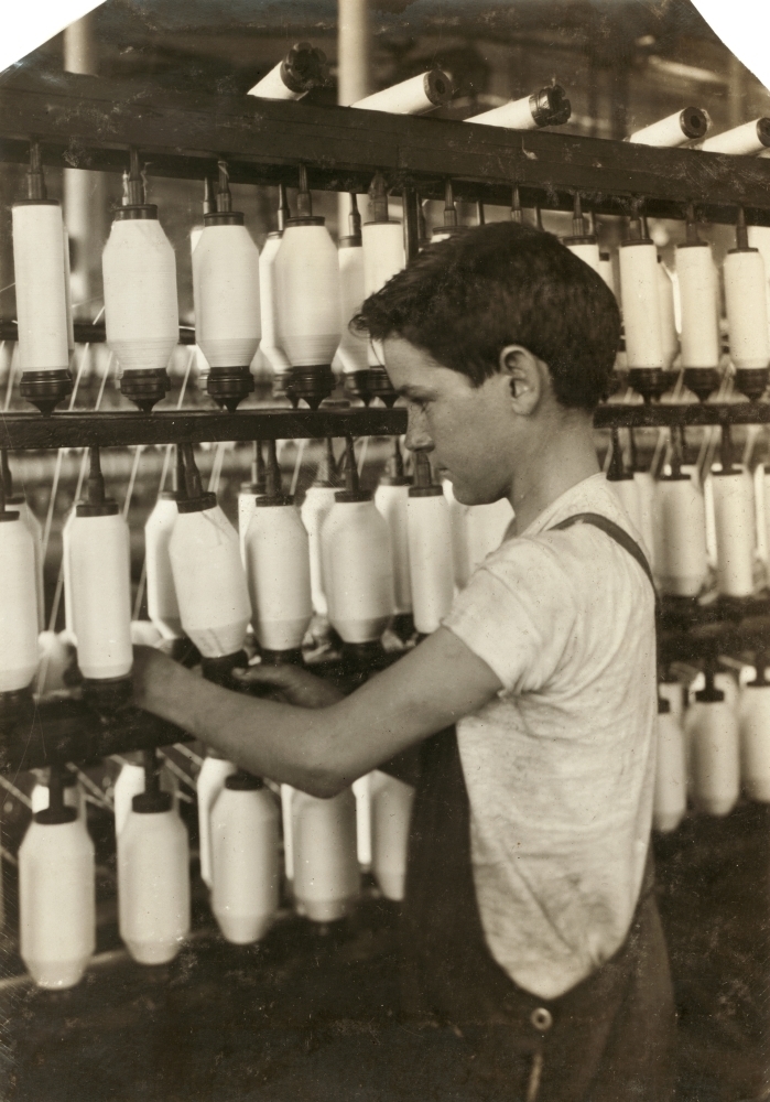 Hine Child Labor 1916. Na Young Boy Spinning At The Textile Mill In