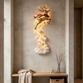 thumbnail image 4 of Traditional Lighted Christmas Wall Decoration with a Gold Leaping Reindeer with a Red Scarf, Cascading LED Hanging Pendant for Hallway and Staircase Wall Decor (Antique Gold), 4 of 5