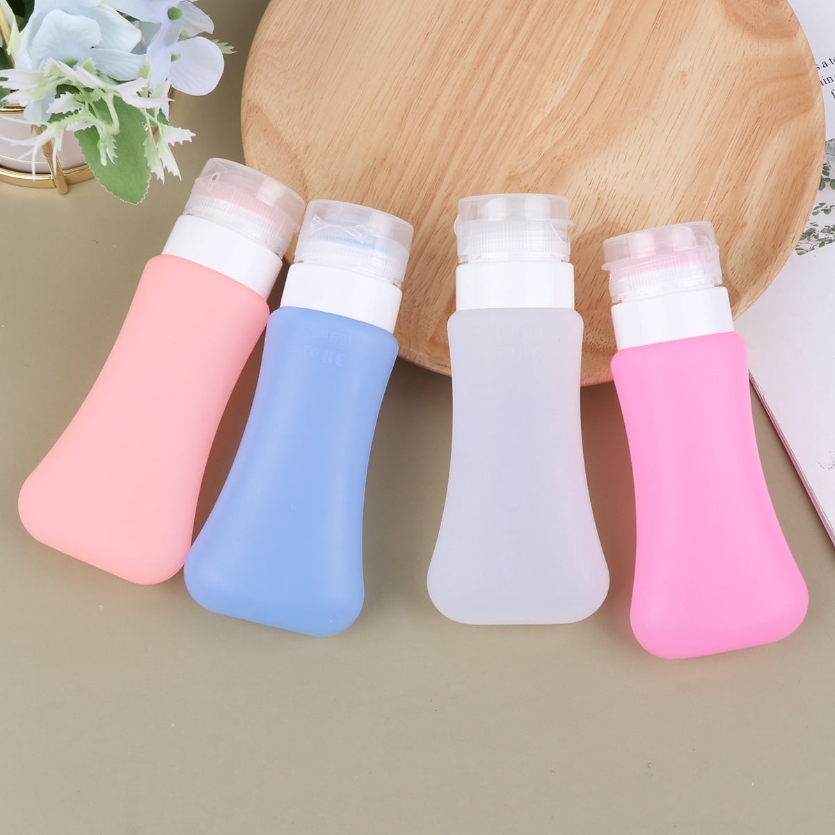 FONDOTIN 4Pcs Silicone Dispense Bottles Leakproof Refillable Travel Containers White Orange 60ml
