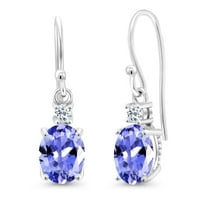 Gem Stone King 10K White Gold Blue Tanzanite and White Topaz Dangle Earrings for Women (2.48 Cttw, Gemstone Birthstone, Oval 8x6mm)