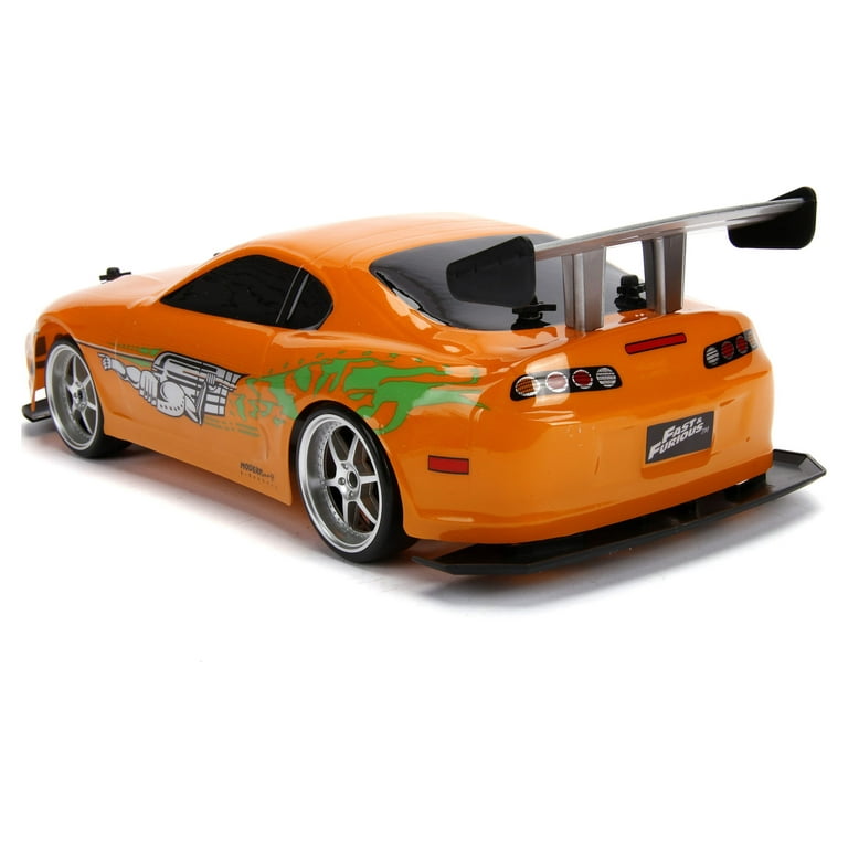  Jada Toys Fast & Furious 1:10 Toyota Supra Remote Control Car  Drift Slide RC with Extra Tires 2.4GHz, Toys for Kids and Adults,  Orange,black : Toys & Games