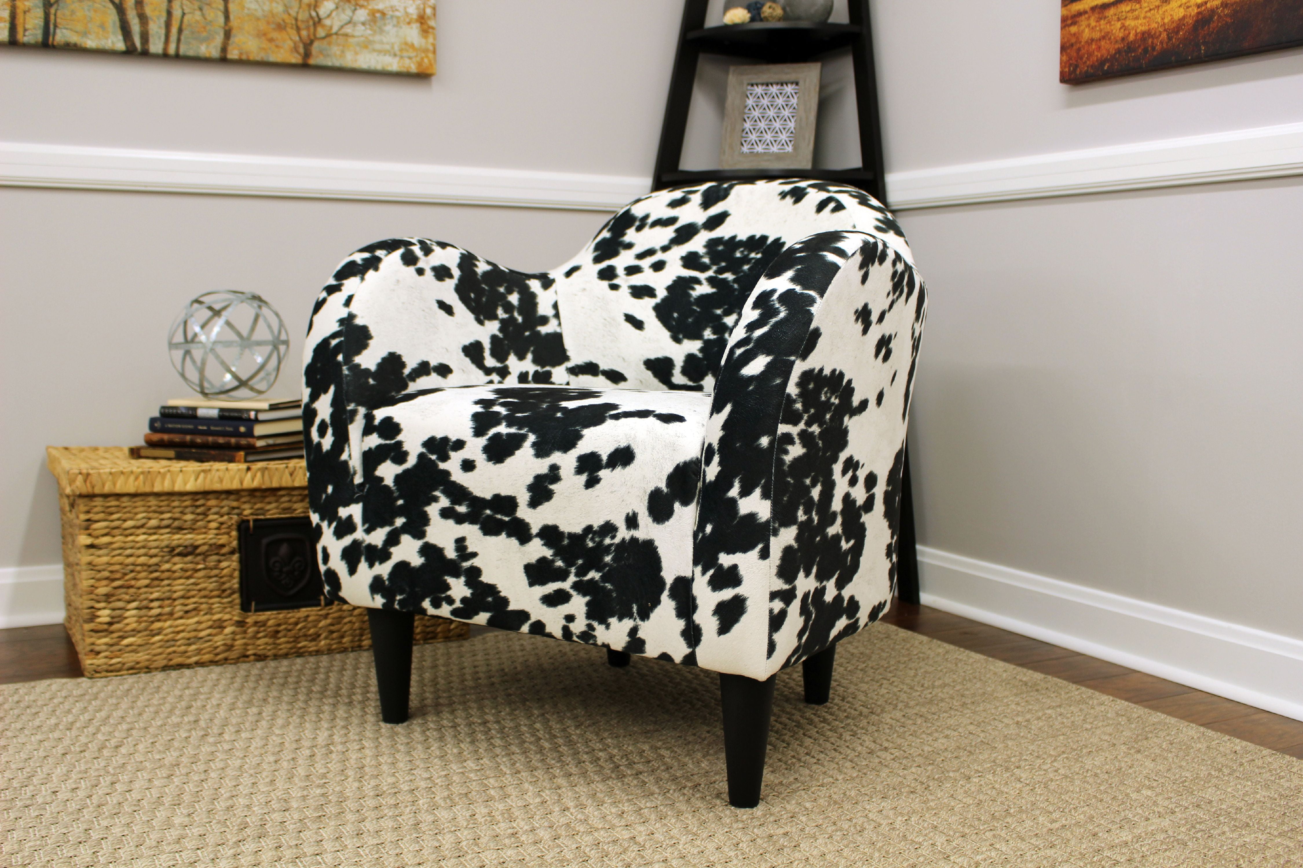 cowhide chair inspired living room