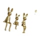 thumbnail image 5 of Figura decorativa abstracta de conejos con hojas metálicas, ideal como centro de mesa, estantería, escritorio o armario., 5 of 8