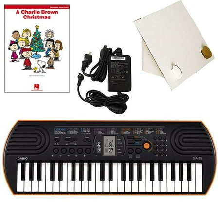 Casio SA-76 44 Key Mini KeyboardDeluxe Bundle Includes Bonus Casio AC Adapter, Desktop Music Stand & A Charlie Brown Christmas Beginning Piano Solo Songbook