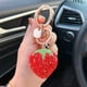 thumbnail image 2 of LLavero de corazón rojo fresa con diamantes de imitación de arcilla para mujer y niña, joyería de fruta, llavero de coche bonito, llaveros para mujer xuanjing unisex, 2 of 2