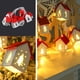 thumbnail image 4 of Guirnalda de luces de madera de 2 m con diseño de árbol de Navidad hueco | Luces LED blanco cálido | 10 casas | Alimentación por batería o USB, 4 of 5