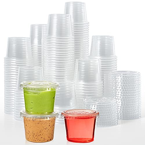 Small disposable plastic shop cups with lids