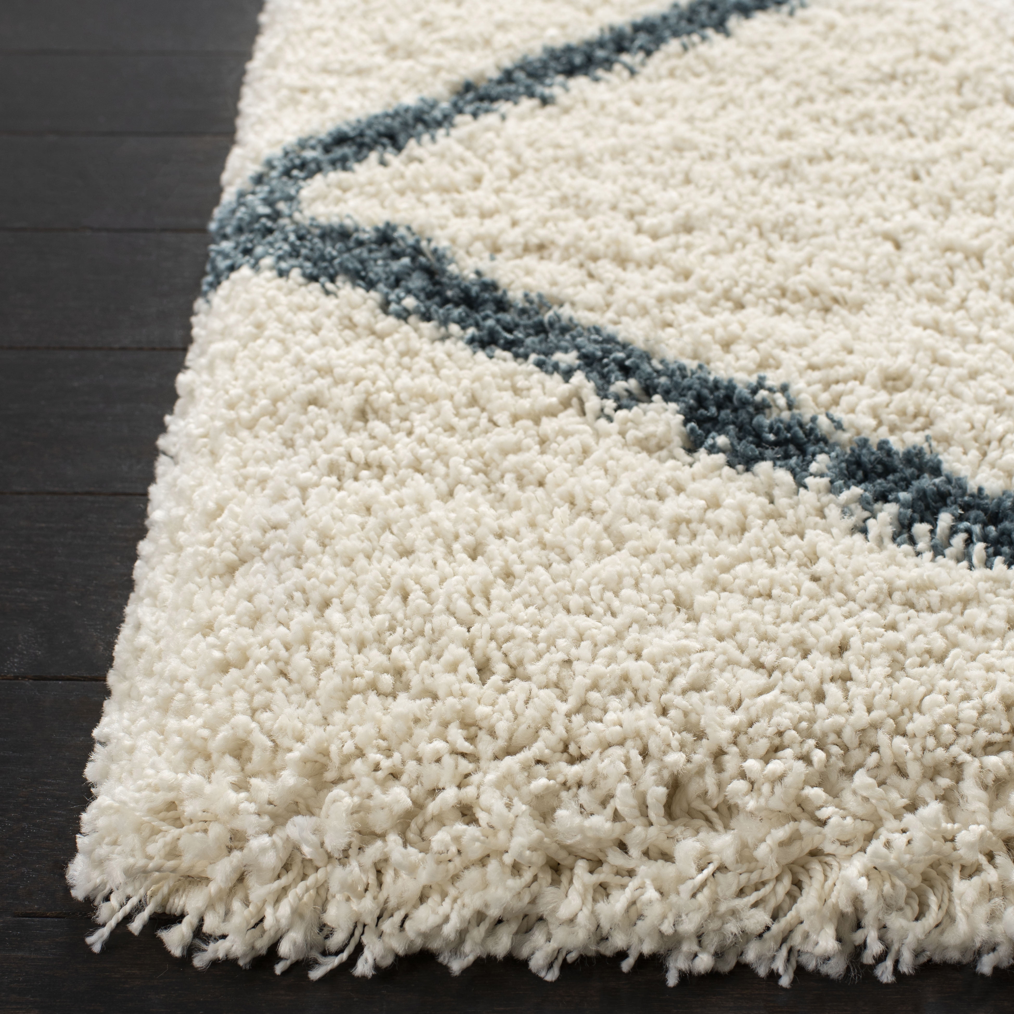 SAFAVIEH Hudson Amias Geometric Shag Area Rug, Ivory/Slate Blue, 5'1" x 7'6"