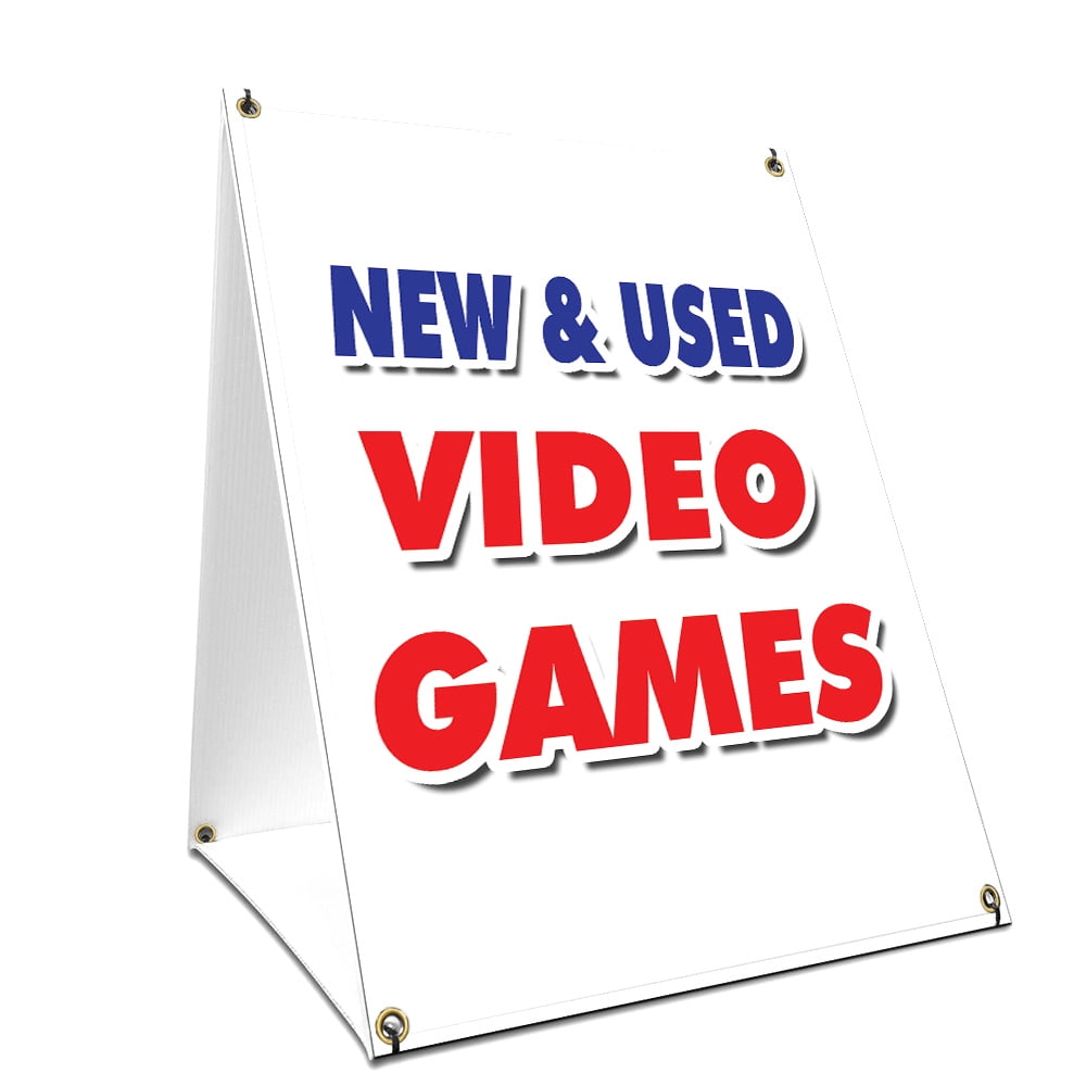 A frame Sidewalk New Used Video Games Sign With Graphics On Each Side