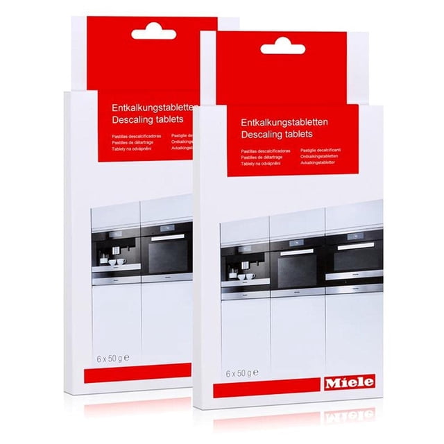 tabletas desincrustantes miele 10178330 para cafetera (12 tabletas) Paquete doble frontal con dos cajas blancas y rojas que muestran texto bilingüe 'Descaling tablets' y el logo Miele; cada caja indica 6 comprimidos (12 en total) y la imagen de una cocina empotrada. Vista frontal, uso recomendado para mantenimiento de cafeteras Miele CVA 2650.
