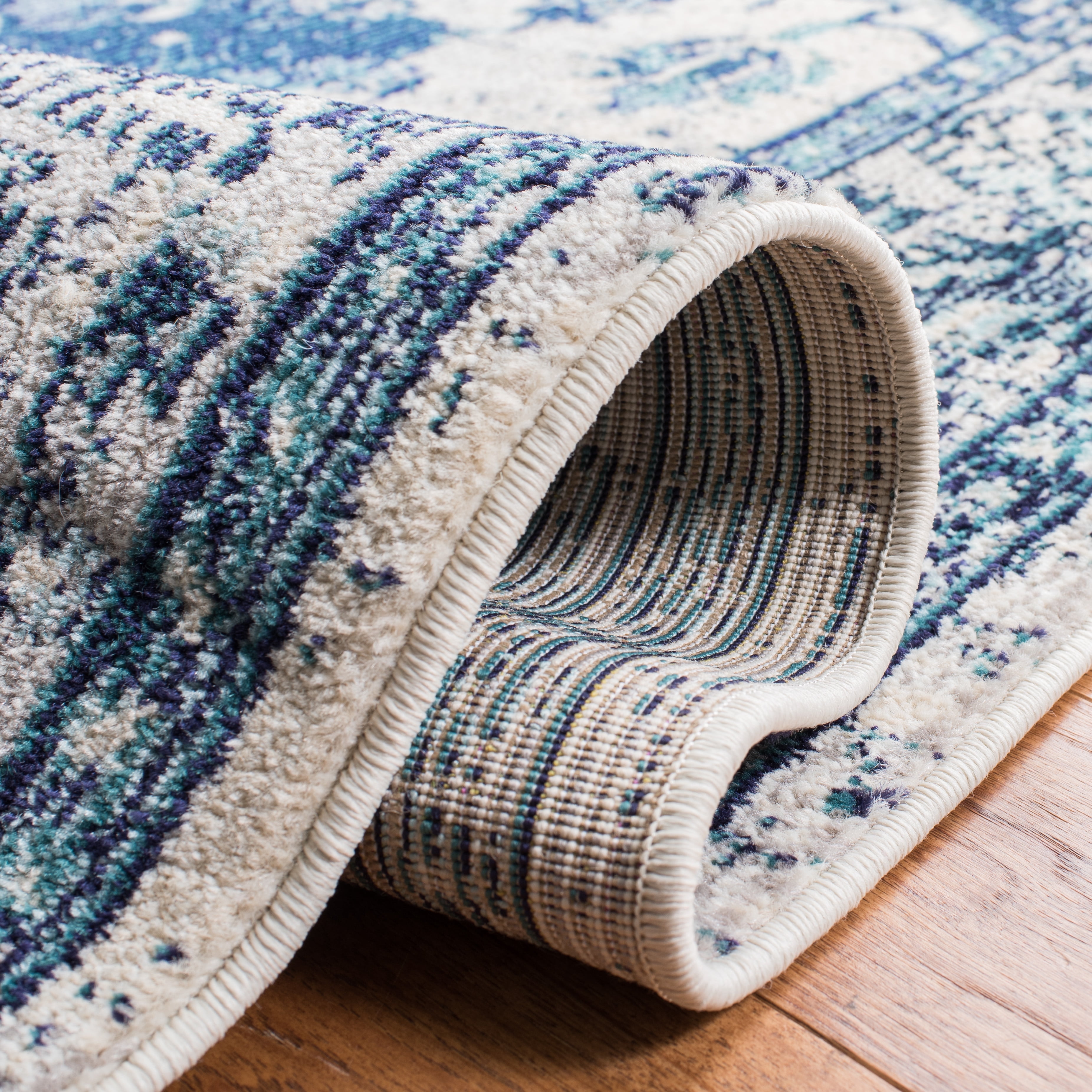 SAFAVIEH Monaco Toria Traditional Area Rug, Ivory/Blue, 5'1" X 7'7" - Traditional Design, Ivory & Blue, Ideal for Living Room, Bedroom, Dining Space