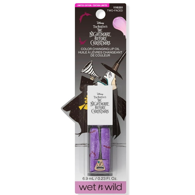 COLOR-CHANGING LIP OIL - Nightmare Before Christmas by wet n wild, 6.9 mL (0.23 fl oz) hydrating lip oil with purple glitter inside, featuring Tim Burton's The Nightmare Before Christmas character art on packaging, pH-activated formula changes color on lips for a custom shimmer.