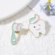 thumbnail image 1 of 2 broches de aleación con forma de cepillo de dientes y pasta dental, de dos estilos diferentes, para mochilas y ropa. Colores surtidos, 29 x 21 mm., 1 of 3