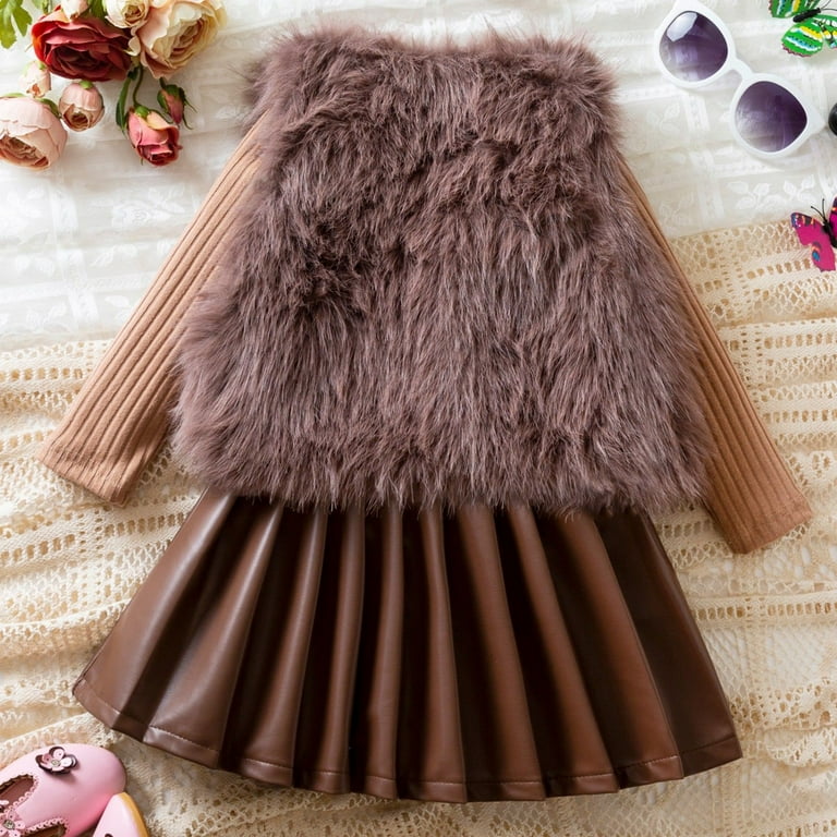 long sleeve dress with fur vest 26 Fabulous Winter Dresses For Any Occasion