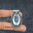 thumbnail image 3 of Adidev 30 Carat Fire Rainbow Topaz Gemstone Oval Shape Rainbow Color 925 Sterling Silver Plated Pendant for Women, 3 of 5