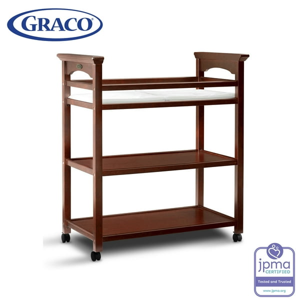 Pottery barn kids west elm x pbk modern changing table. graco lauren changing table with water resistant pad and safety straps included cherry