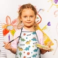 thumbnail image 2 of White Cartoon Dinosaurs Cacti Planets Pattern Kids Aprons for Girls and Boys,Adjustable Neck Strap Toddler Aprons for Kids Cooking Baking, 2 of 3