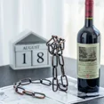thumbnail image 4 of Estantes de vino con cadena de hierro con suspensión mágica, estantes de exhibición de vino para una botella, soporte para cocina, comedor, bodega, bar, decoración, 4 of 6