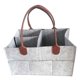 thumbnail image 1 of Bolsa multifuncional para bebés de fieltro grueso con detalles de cuero, ideal para almacenar juguetes, pañales y más. Diseño plegable, gran capacidad y resistencia al desgaste. Disponible en gris, 1 of 5